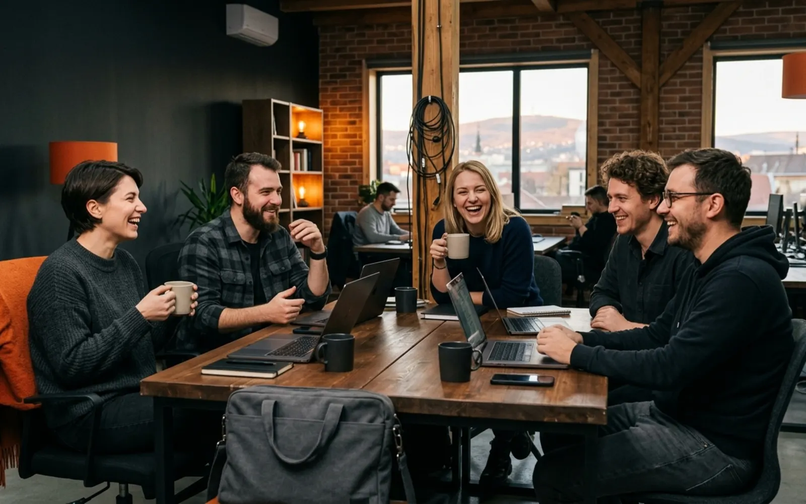 A team talking around a table in an office in Cluj-Napoca